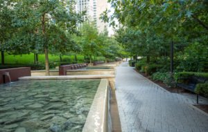 Botanical park featuring cascading waterfalls at the site of a completed Magellan real estate development site.